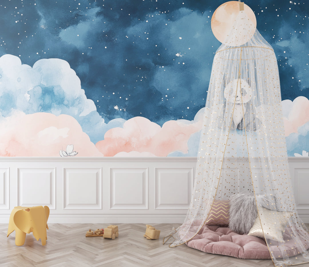 Moon and stars wallpaper in cozy nursery with pink rocking chair and soft lighting