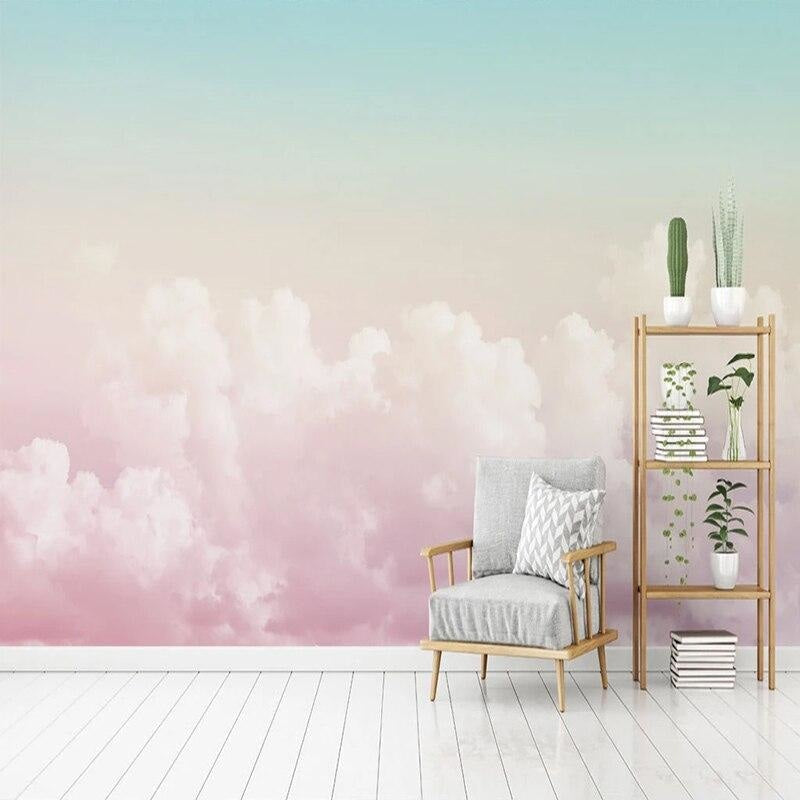 Soft pink sky mural wallpaper brightening up a cozy bedroom with natural light