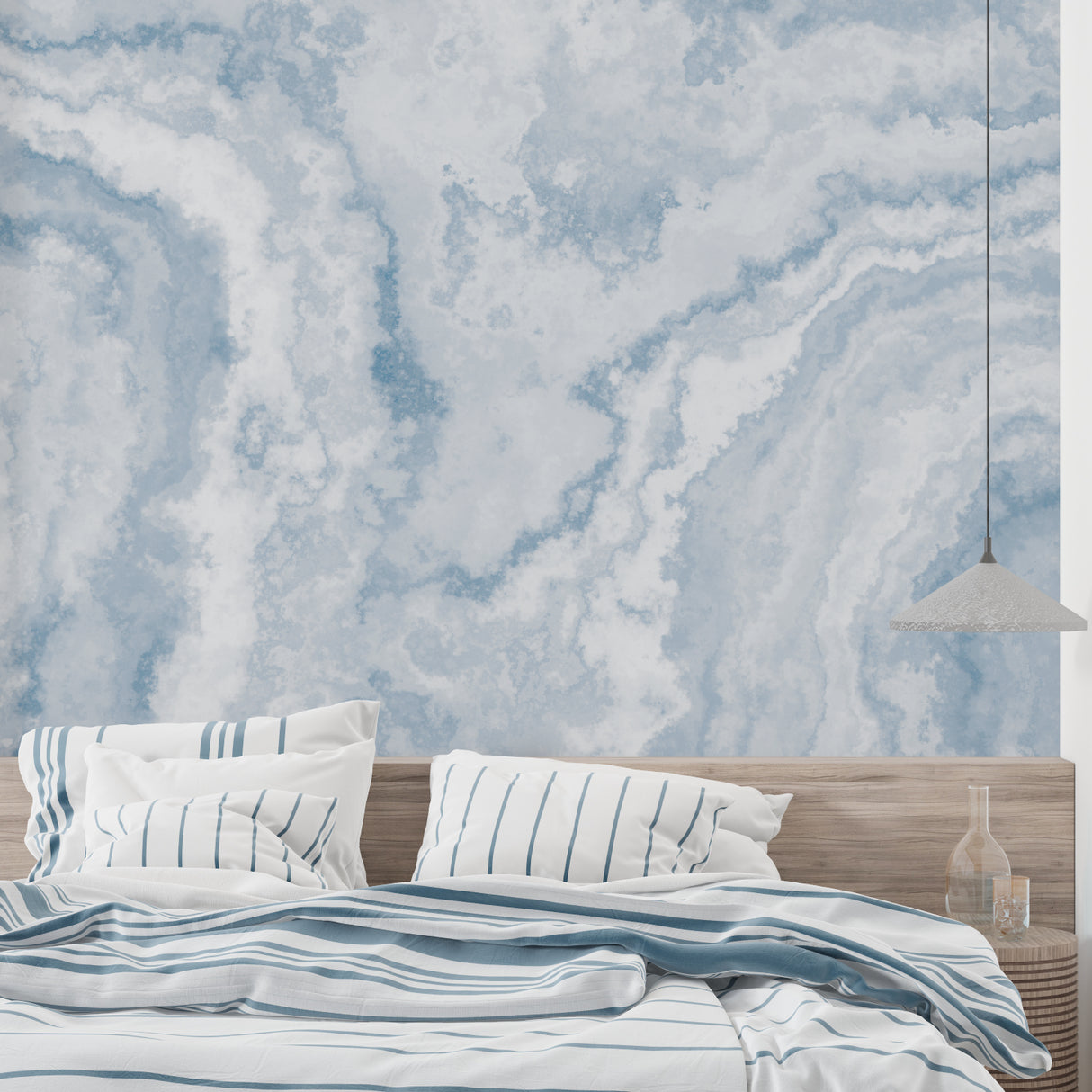 Sky mural installation in a nursery showing the calming effect of cloud patterns