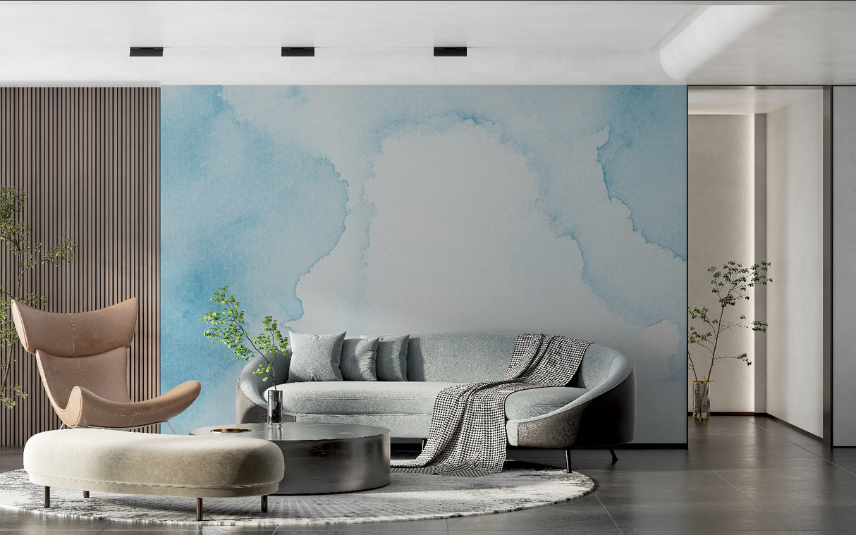 Watercolor cloud wallpaper creating depth in modern living room with natural light