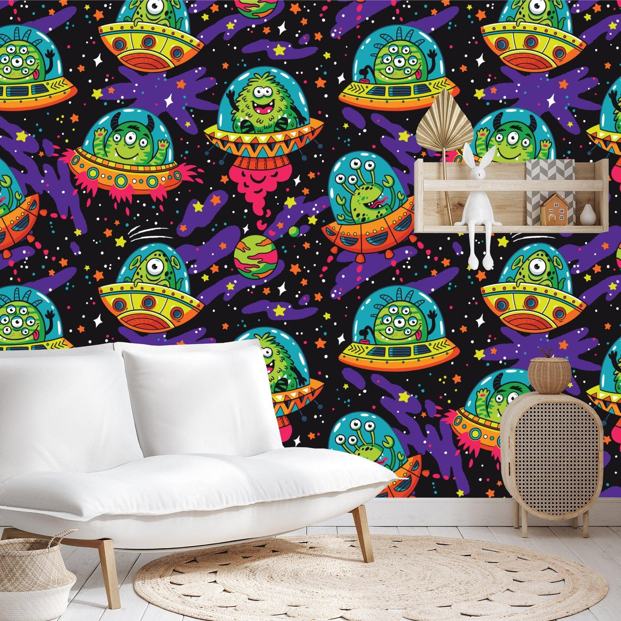Playroom transformed with cartoon space aliens wallpaper, showing scale and vibrant colors
