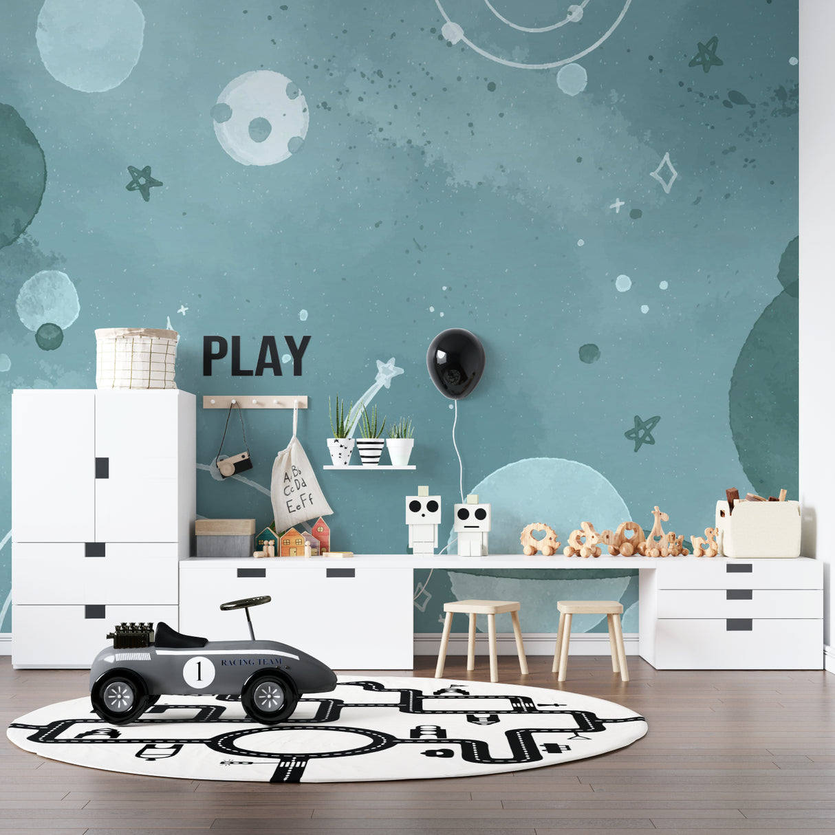 Space galaxy wallpaper in modern kids bedroom showing floating planets and stars against soft blue background