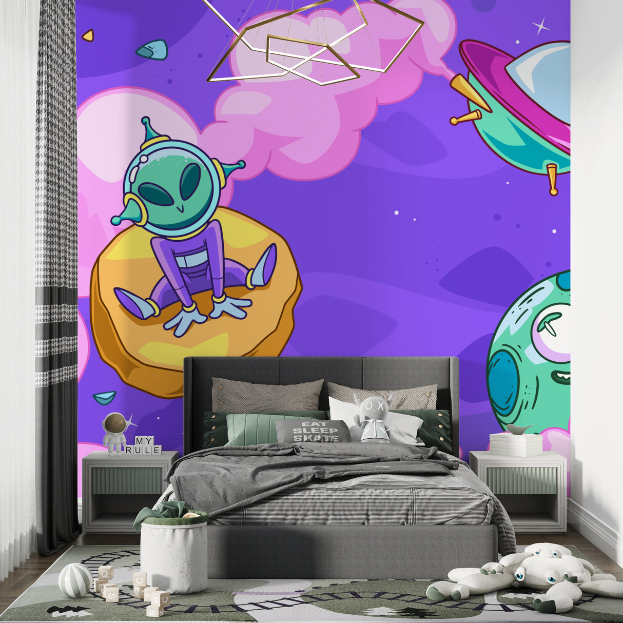 Fun alien theme wall mural displayed in modern kids gaming room setup