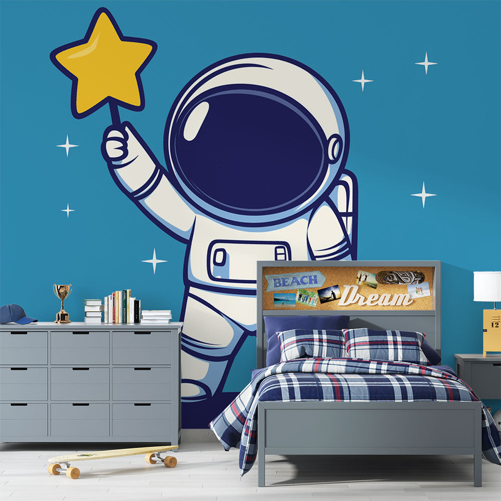 Space Mural Wallpaper with cartoon astronaut displayed in a modern children's bedroom, showing scale and peaceful atmosphere