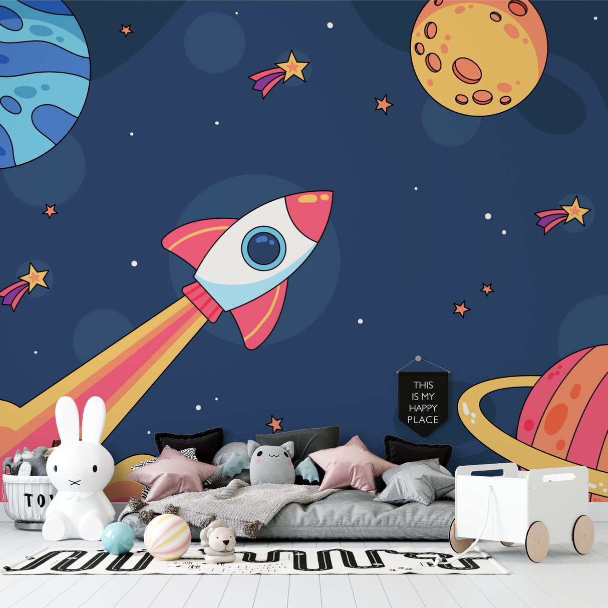 Space themed wall mural displayed in playroom showing scale and vibrant colors