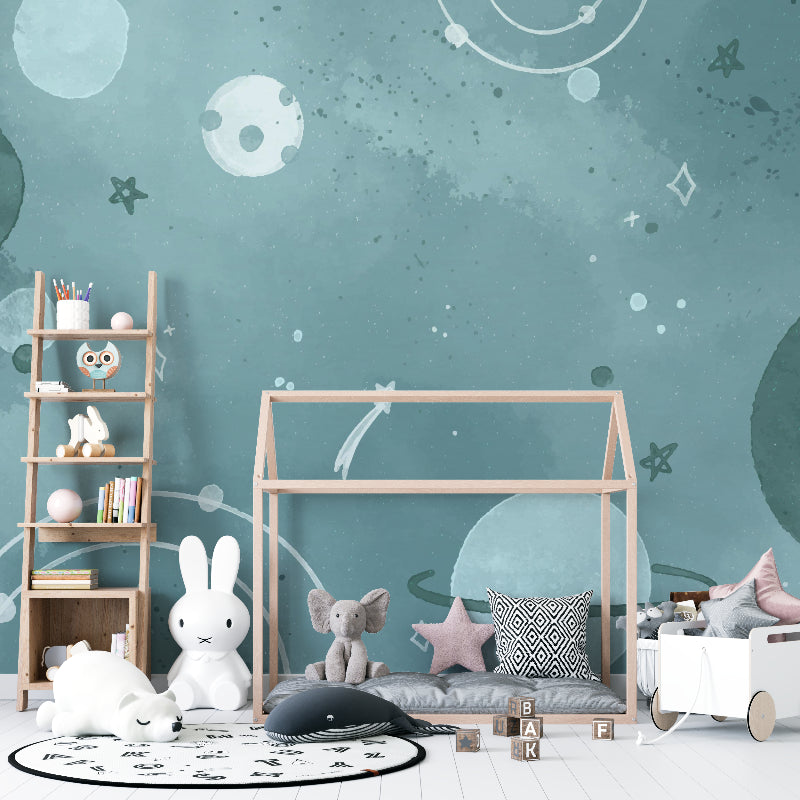 Galaxy wall mural brightening a child's playroom with cosmic elements