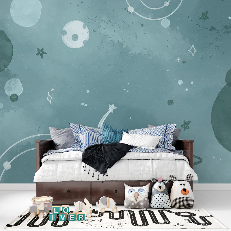Space wallpaper transforming a reading nook into a starlit sanctuary