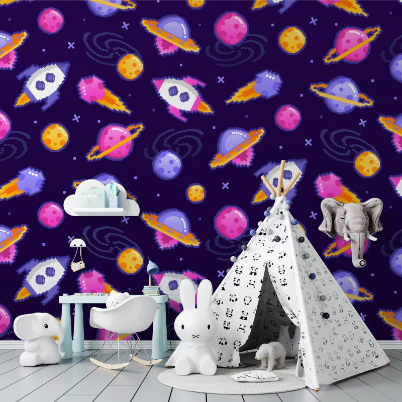 Playroom featuring space themed wall mural with colorful rockets and planets