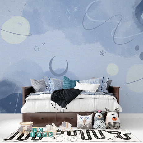 Space theme wallpaper creating a magical atmosphere in a cozy nursery with soft lighting