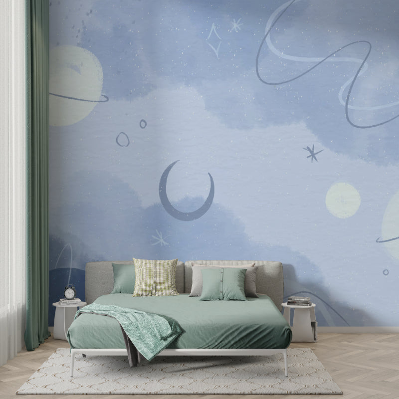 Galaxy wallpaper mural creating a peaceful atmosphere in a modern kids playroom