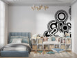 Neon space wallpaper bringing cosmic magic to a modern kids bedroom with glowing rockets and stars