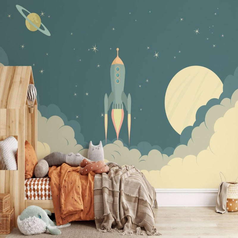 Space rocket wallpaper mural styled in modern kids bedroom with star-themed decor and cozy reading nook