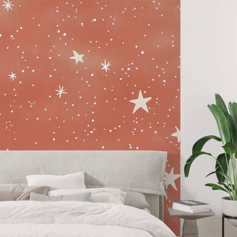 Star pattern wallpaper bringing warmth to a modern living room space