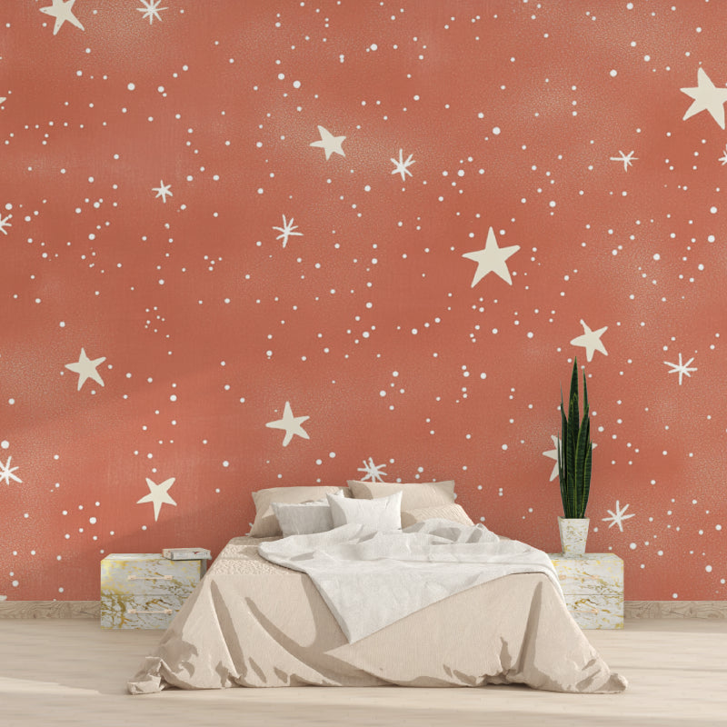 Stars wallpaper transforming a home office with its warm, celestial design