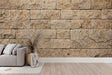 Stone block wallpaper creating a stunning accent wall in a modern living room with beige and natural tones