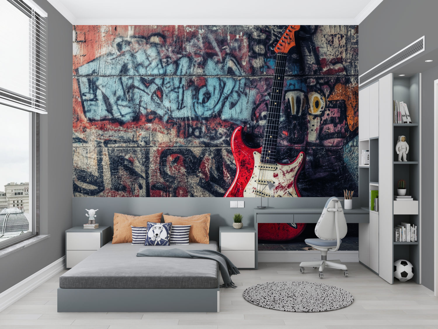 Graffiti mural with guitar creating impact in teen bedroom