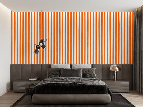 Modern orange striped wallpaper in a bright living room creating visual height and energy