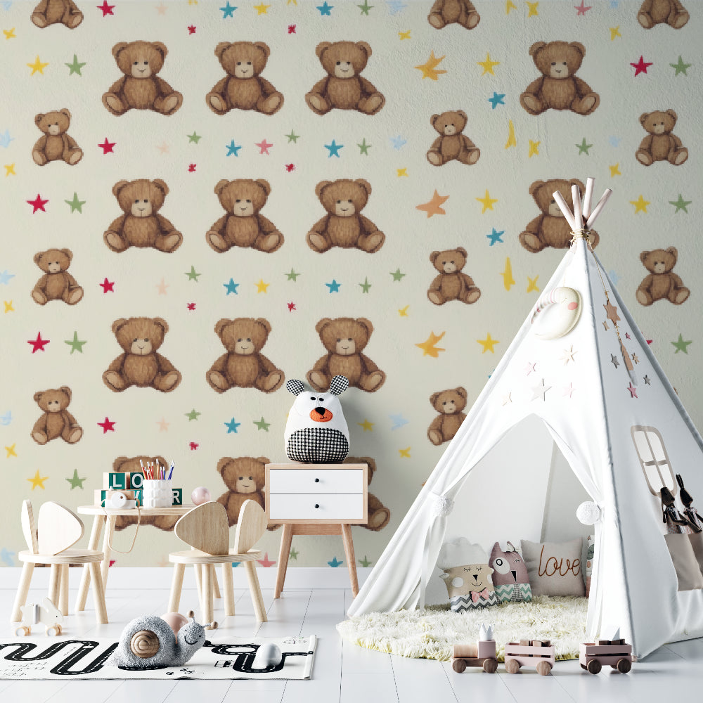 Teddy bear and stars pattern wallpaper brightening up a toddler's bedroom with pink accents