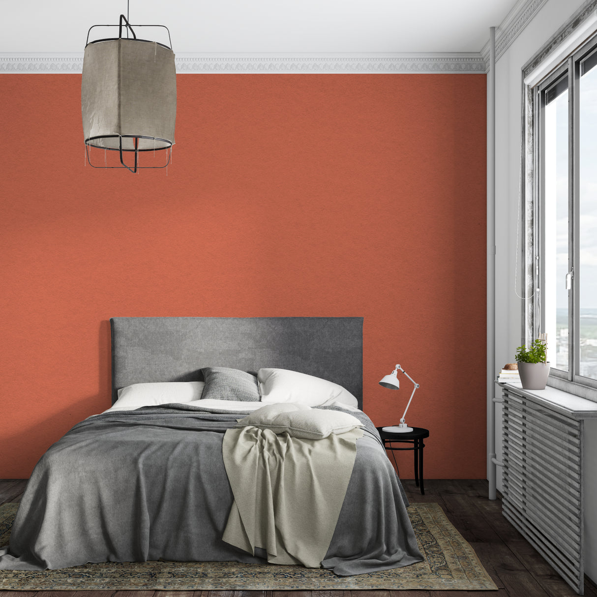 Modern dining room with terracotta wallpaper showing elegant table setting