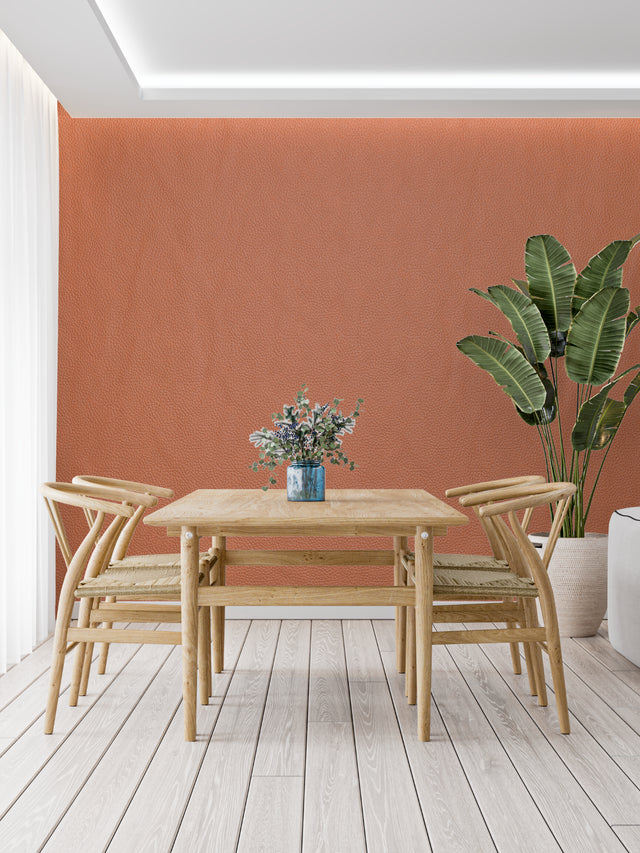 Terracotta textured wallpaper in modern living room with natural light highlighting surface details