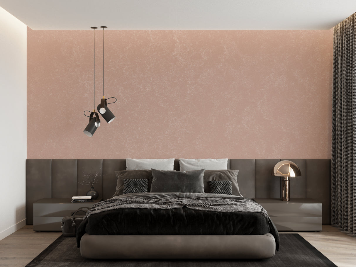 Pink terracotta wallpaper in modern living room with natural light showing textured finish