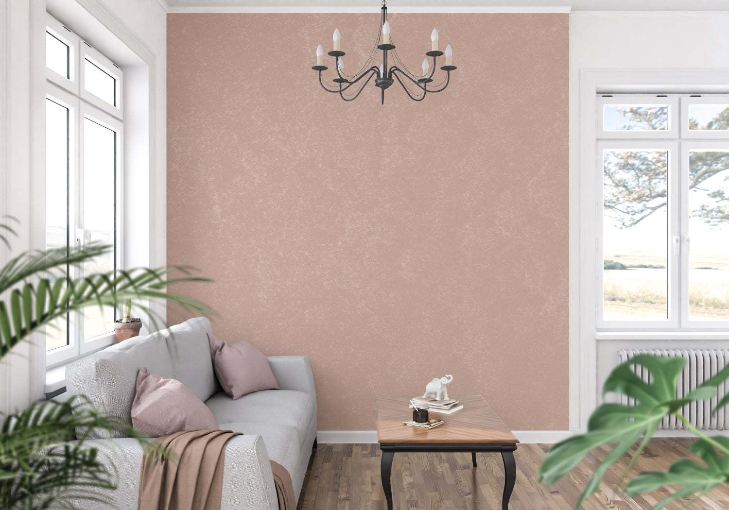 Dining room with pink terracotta wall mural in evening light