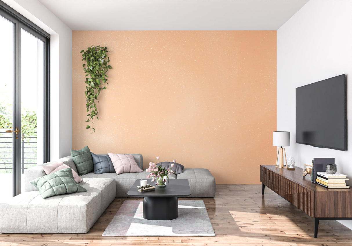 Terracotta speckled wallpaper in modern living room creating warm, inviting atmosphere