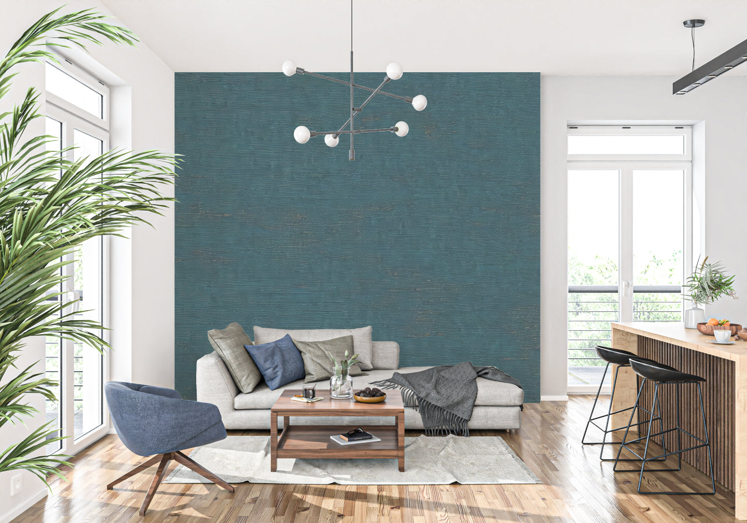 Teal textured wallpaper creating depth in a modern living room with natural light highlighting the organic pattern