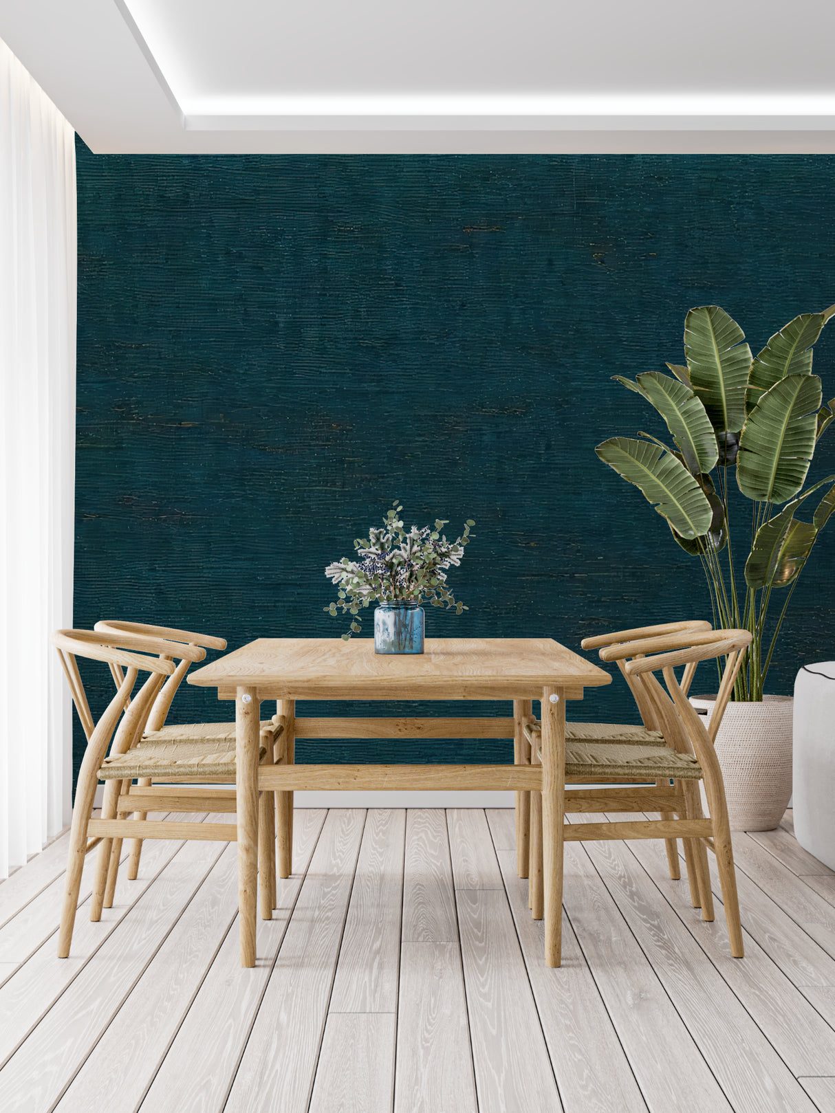 Modern teal wall covering in a minimalist bedroom showing textural detail
