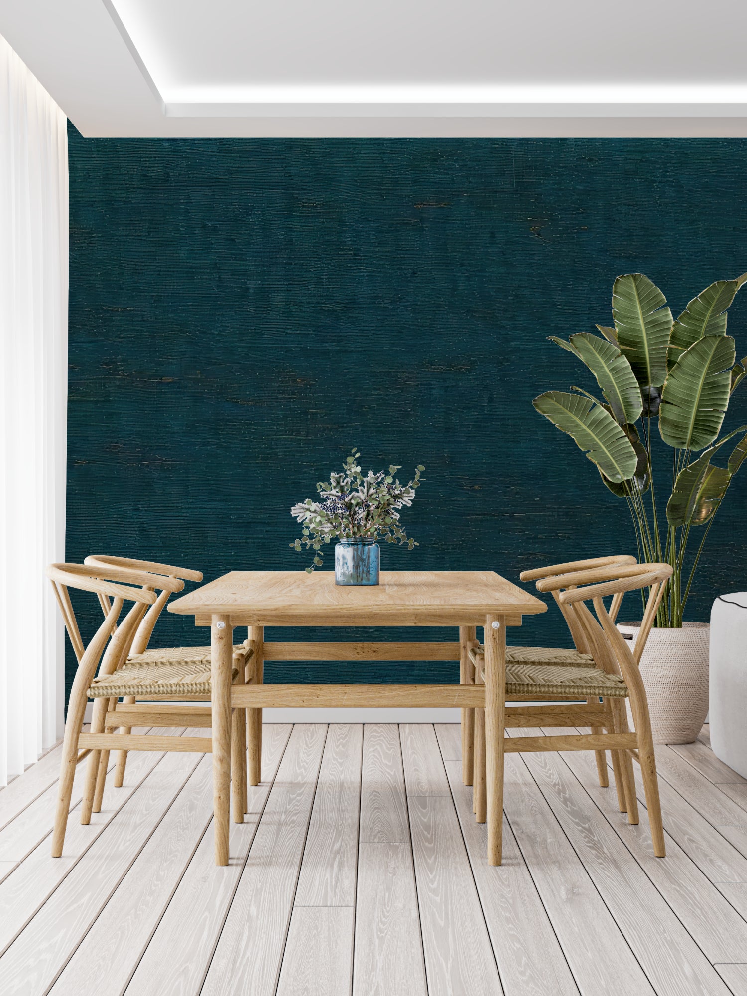 Modern teal wall covering in a minimalist bedroom showing textural detail