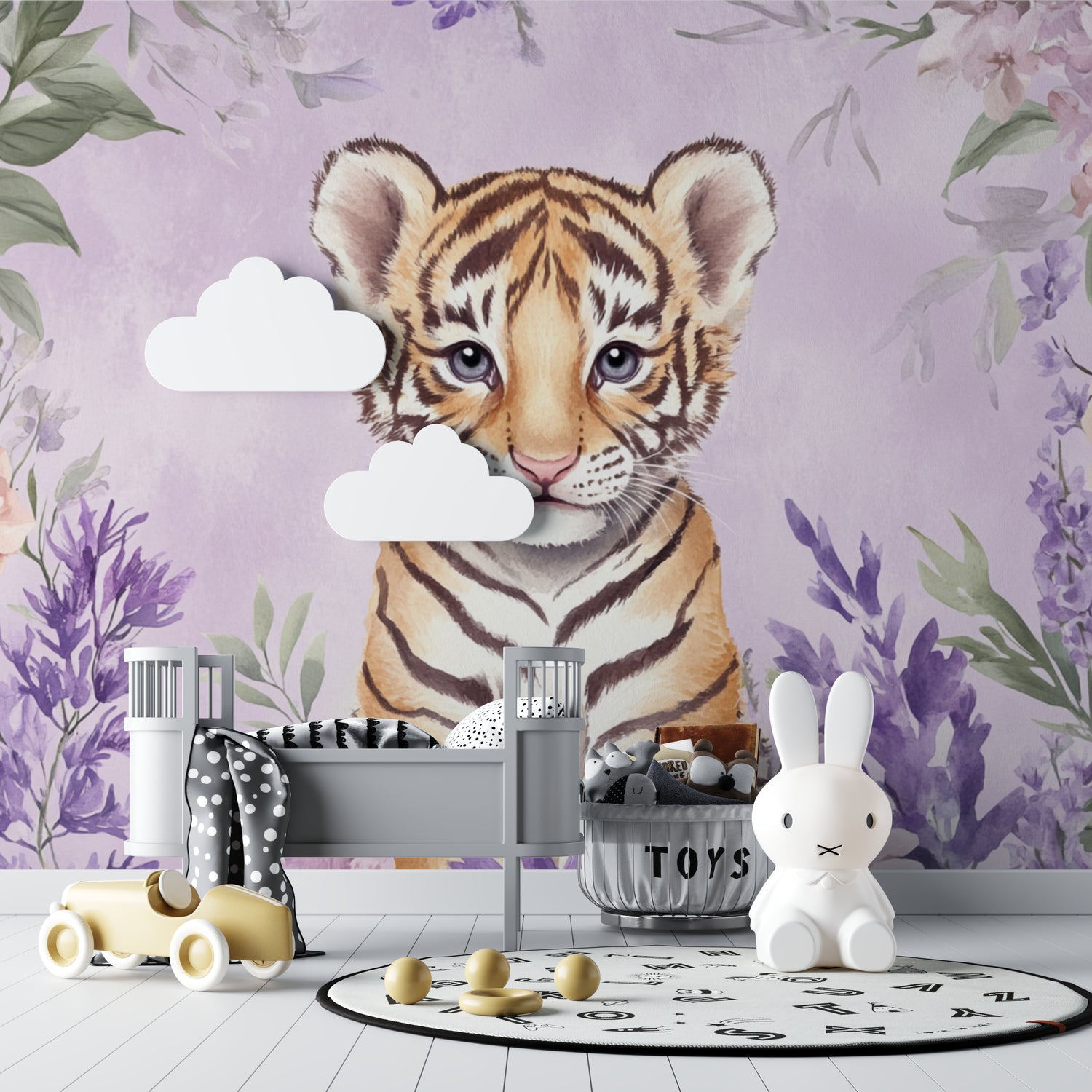 Baby tiger wall mural in a girl's bedroom with matching purple decor
