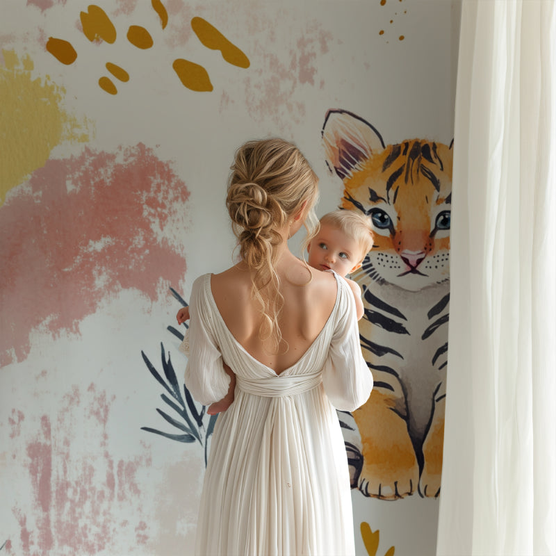 Tiger wall mural in baby nursery showcasing the soft pink and yellow tones