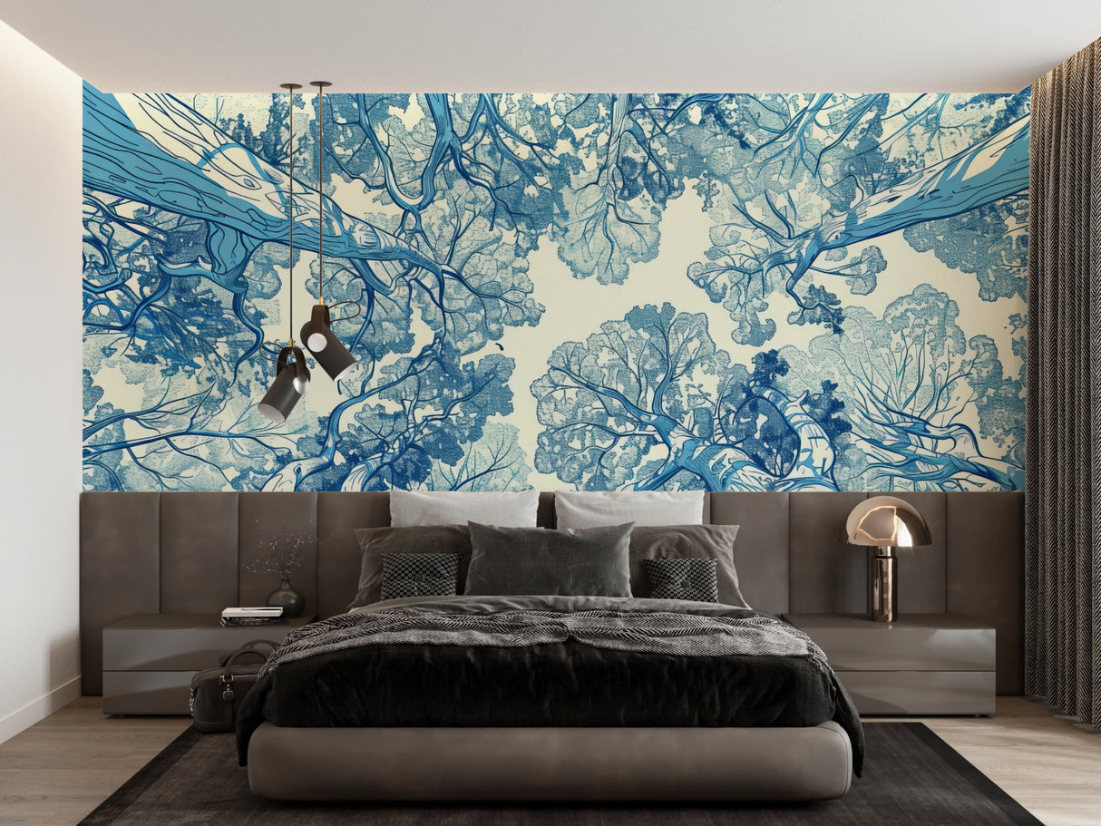 Tree canopy wallpaper creating a peaceful atmosphere in a modern living room with blue accents