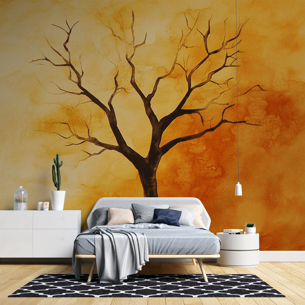 Modern tree silhouette wallpaper mural shown in a bright living room setting with minimal furniture