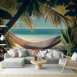 Tropical beach paradise mural wallpaper creating a relaxing atmosphere in a modern living room with white furniture