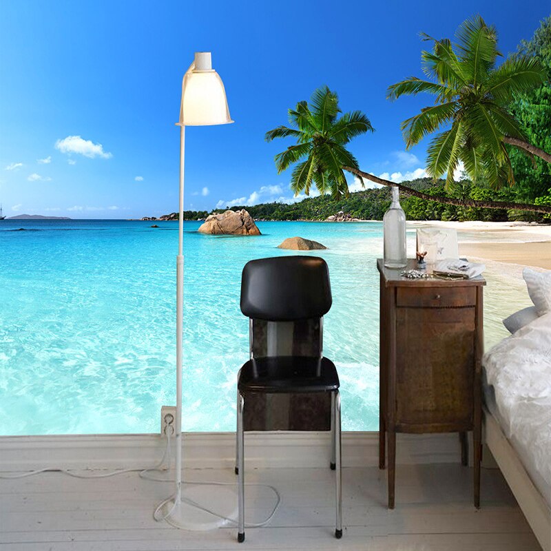 Tropical beach scene adding depth to a minimalist dining room