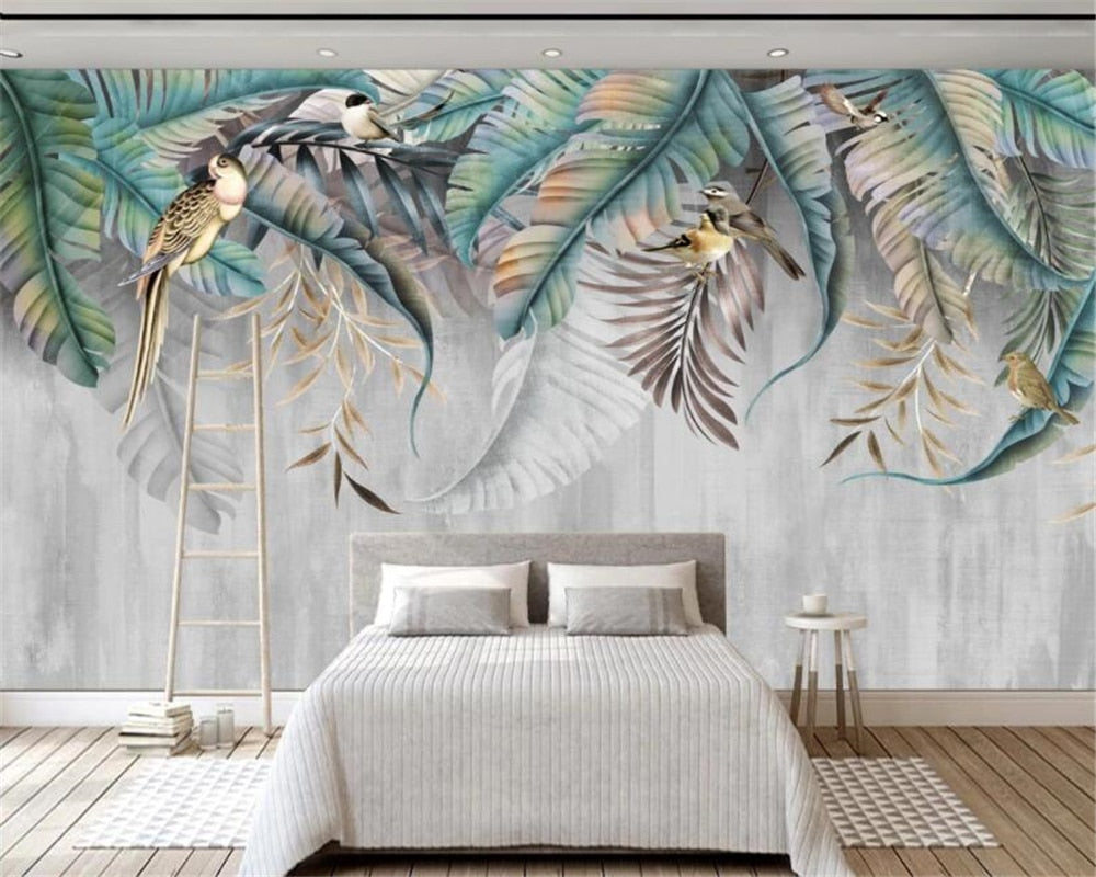 Tropical birds wallpaper with grey leaves creating a calm atmosphere in a modern living room