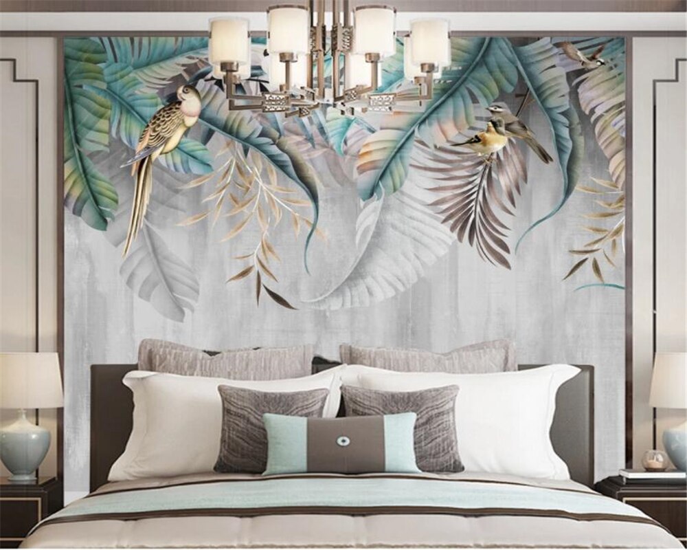 Exotic birds and palm leaves wallpaper making a stunning backdrop in a bright bedroom