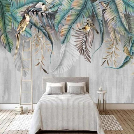 Tropical birds wallpaper creating a calm atmosphere in a modern living room with grey sofa and natural light