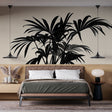 Tropical palm leaf wallpaper in modern living room, black palm leaves on beige creating dramatic natural focal point