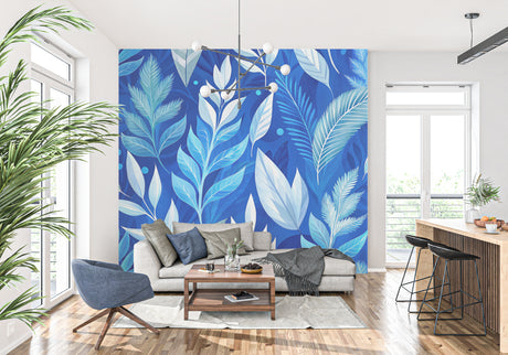 Blue tropical palm leaf wallpaper in modern living room with white sofa and natural light