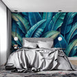 Tropical leaf wallpaper creating a stunning focal point in a modern living room with white furniture