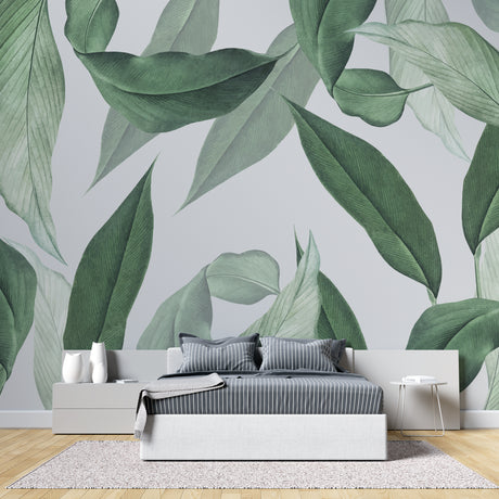 Tropical leaf wallpaper creating a fresh atmosphere in a modern living room with white sofa