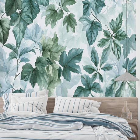 Botanical leaf wallpaper creating a fresh atmosphere in a modern living room with natural light