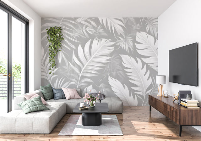 Tropical leaf wallpaper in modern grey living room showing floating monstera pattern