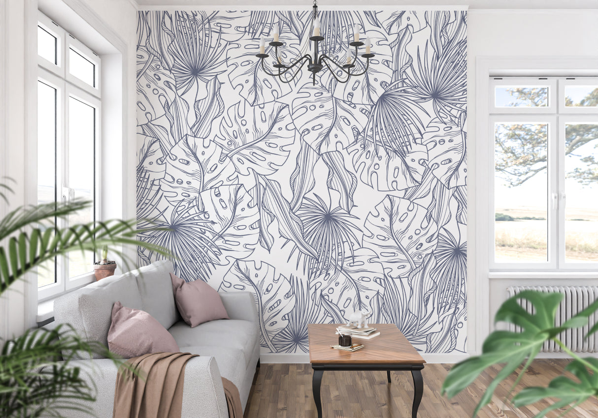 Blue tropical line art wallpaper in modern living room with white sofa and natural light