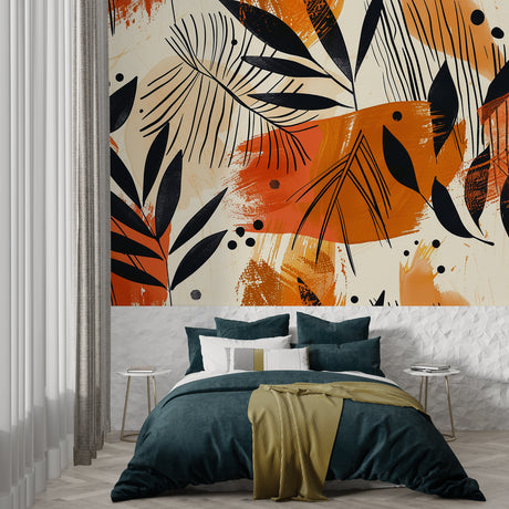 Tropical leaf wallpaper bringing warmth to a modern living room with black and orange pattern