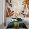 Tropical leaf wallpaper in modern living room with terracotta and black abstract design
