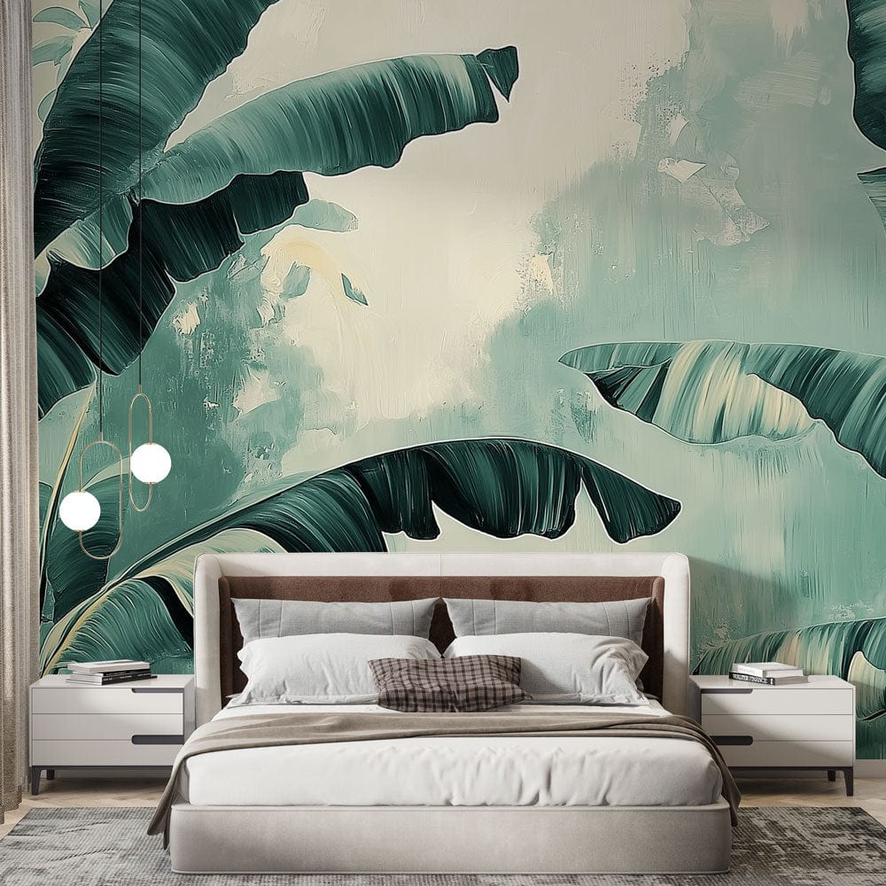 Tropical banana leaf wallpaper creating a fresh statement wall in a modern living room with white furniture