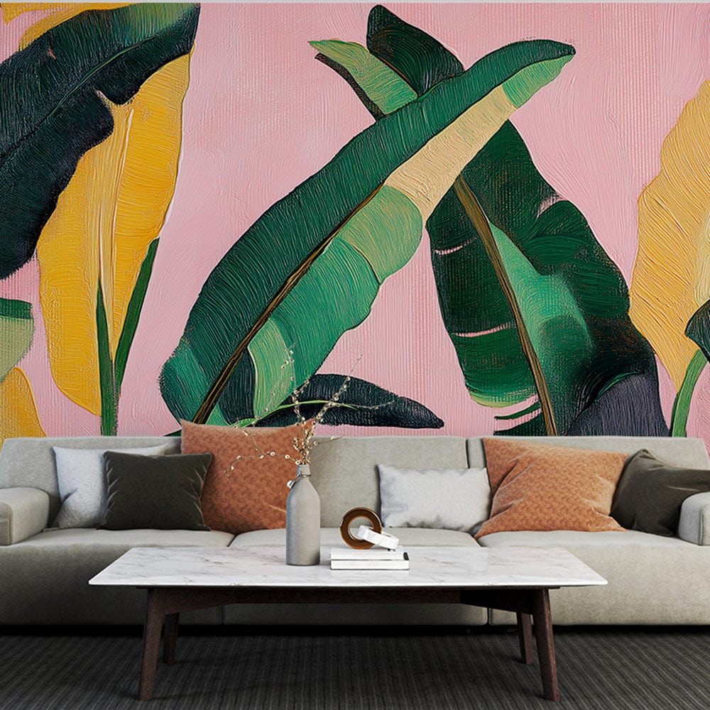 Tropical leaf wallpaper in pink and green creating a fresh, modern look in a bright dining room setting